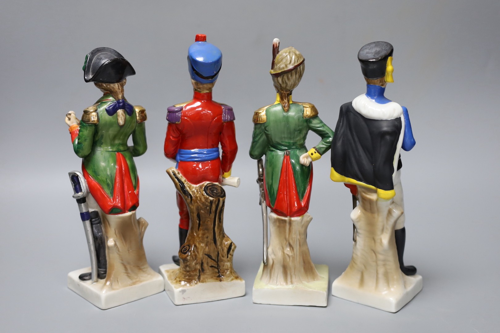 A set of four Continental porcelain models of soldiers, tallest 22 cms high.